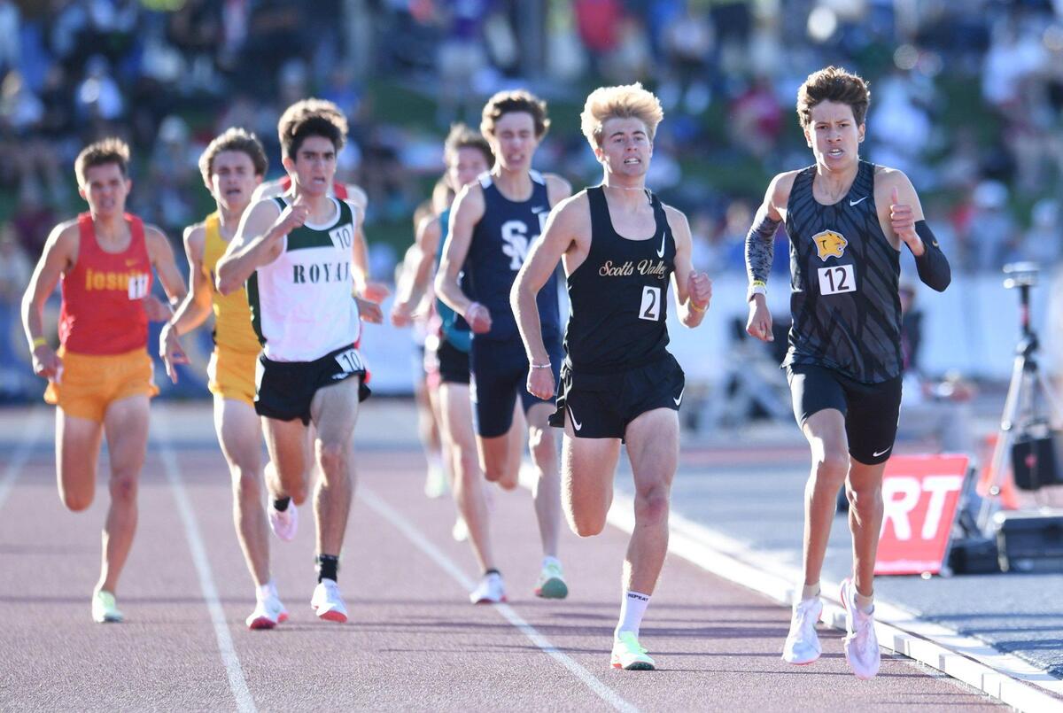 Clovis High’s Christopher Caudillo, far right, leads the pack to place first in the Boys 1600m Run at the CIF State Track and Field Championship finals Saturday, May 28, 2022 in Clovis.