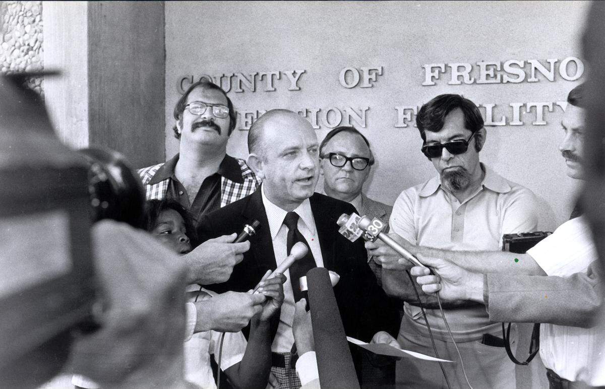 The Fresno Bee Four, from left, Joe Rosato, George Gruner, William K. Patterson and James Bort, Jr., on Sept. 3, 1976 outside Fresno County Jail.