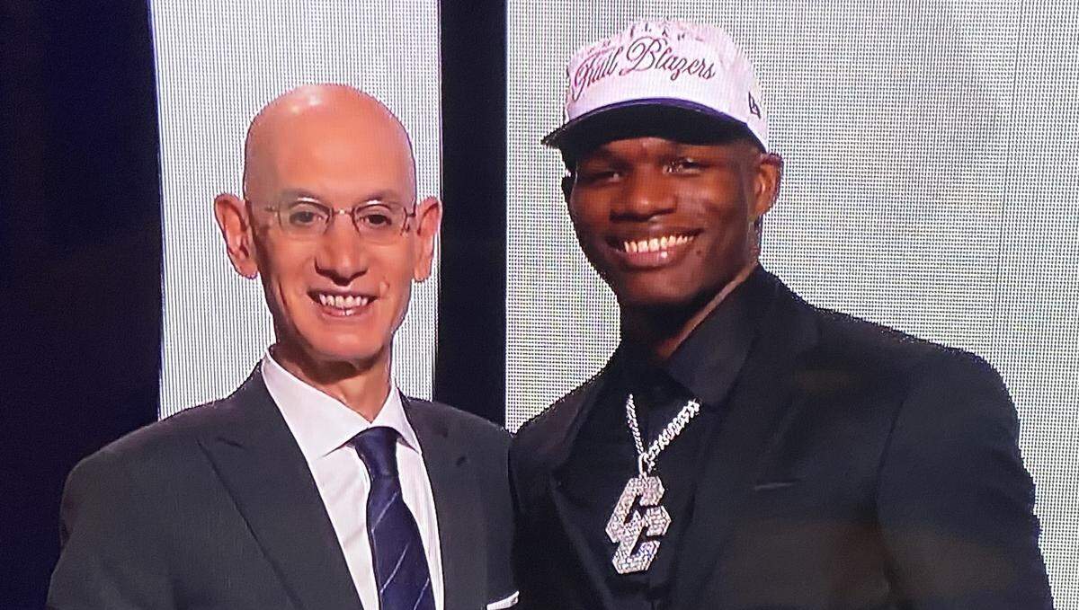 Cedric Coward poses alongside NBA Commissioner Adam Silver following Coward’s selection with the No. 11 pick at the 2025 NBA Draft in Brooklyn, New York. The Memphis Grizzlies acquired Coward’s rights in a draft-night trade with the Portland Trailblazers.