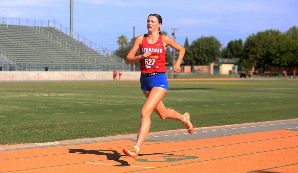 Buchanan High junior Avery Hutchison finished first in 11:06.8 in the junior girls race of the Kingsburg 2 Mile cross country meet at Kingsburg High on Sept. 9, 2023.