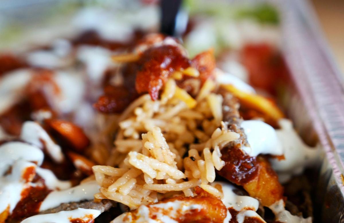 A combination chicken and lamb rice platter from Halal Bros. Photographed Monday, 2023 in Fresno.