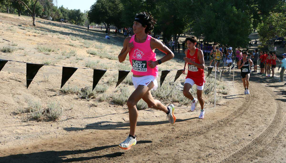 Oakdale High senior Omar Alsaidi placed eighth in 15:10.5 in the Rob Brenner championship race of the 44th ASICS Clovis Invitational at Woodward Park on Oct. 7, 2023. Oakdale placed third.