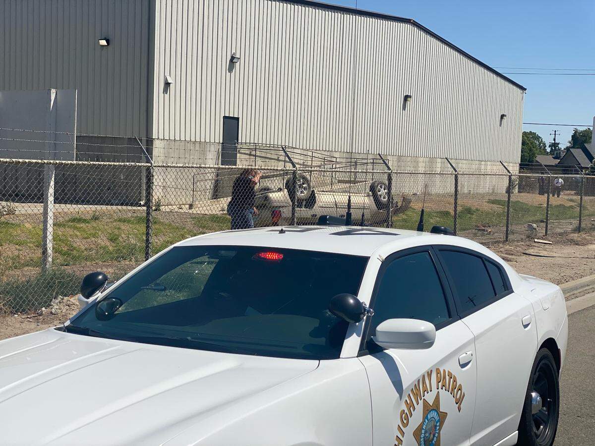A woman was seriously injured after her vehicle overturned with two children inside in Fresno, California on Tuesday, May 11, 2021. The children were not hurt.