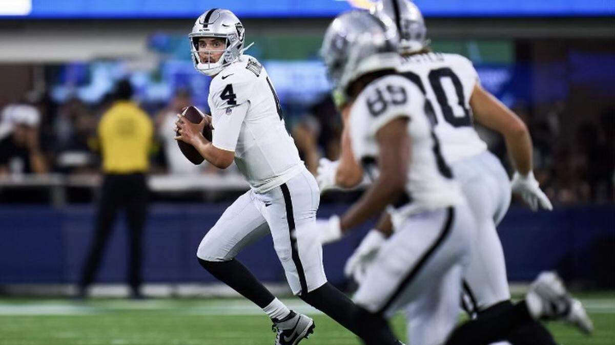 Las Vegas Raiders rookie quarterback Aidan O’Connell looks to pass in an exhibition game against the Los Angeles Rams on Saturday, Aug. 19, 2023.