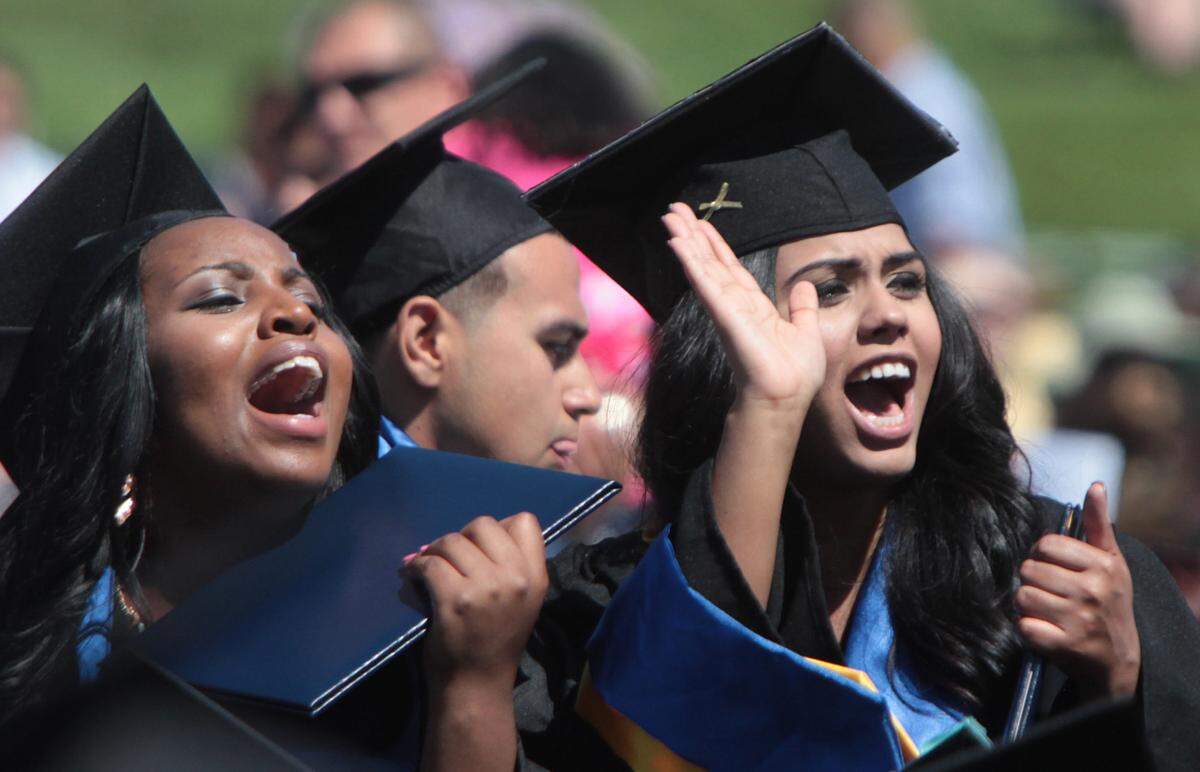 University of California, Merced, graduates scream during a May 2013 commencement ceremony on campus.