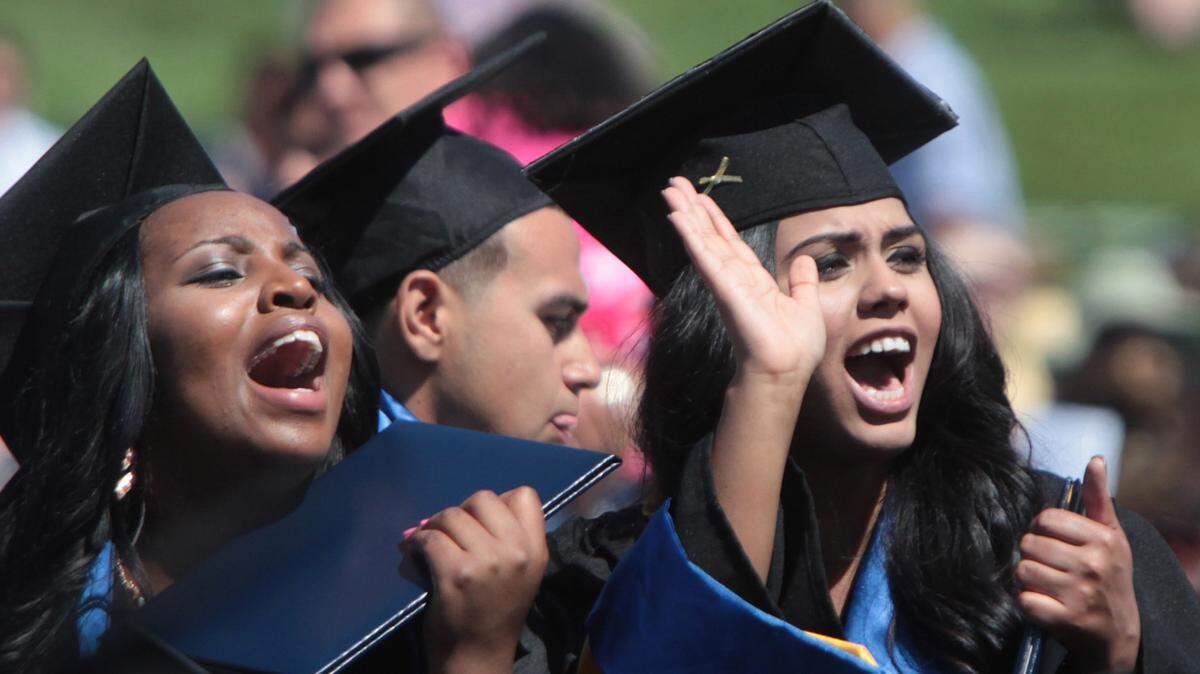 University of California, Merced graduates scream during May 2013 commencement ceremony on campus.