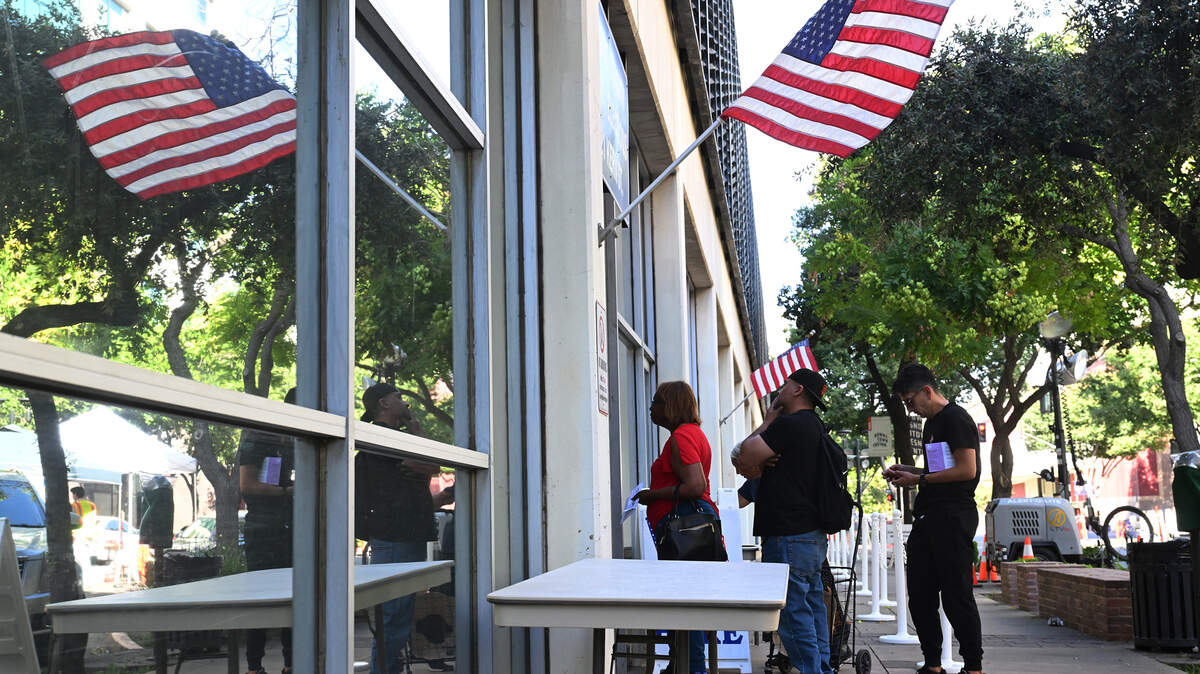 Voters wait in line outside the Fresno County Clerk/Election office on Election Day Tuesday, June 2, 2026 in downtown Fresno.