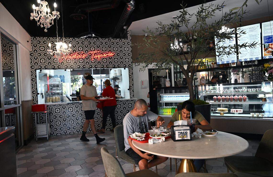Jairo and Selena Lozano, right, enjoy the food at newly-opened Frida’s Azul offering Mexican food as well as breakfast items like eggs and chilaquiles at its Herndon and Willow avenues location in Clovis Thursday, July 24, 2025.