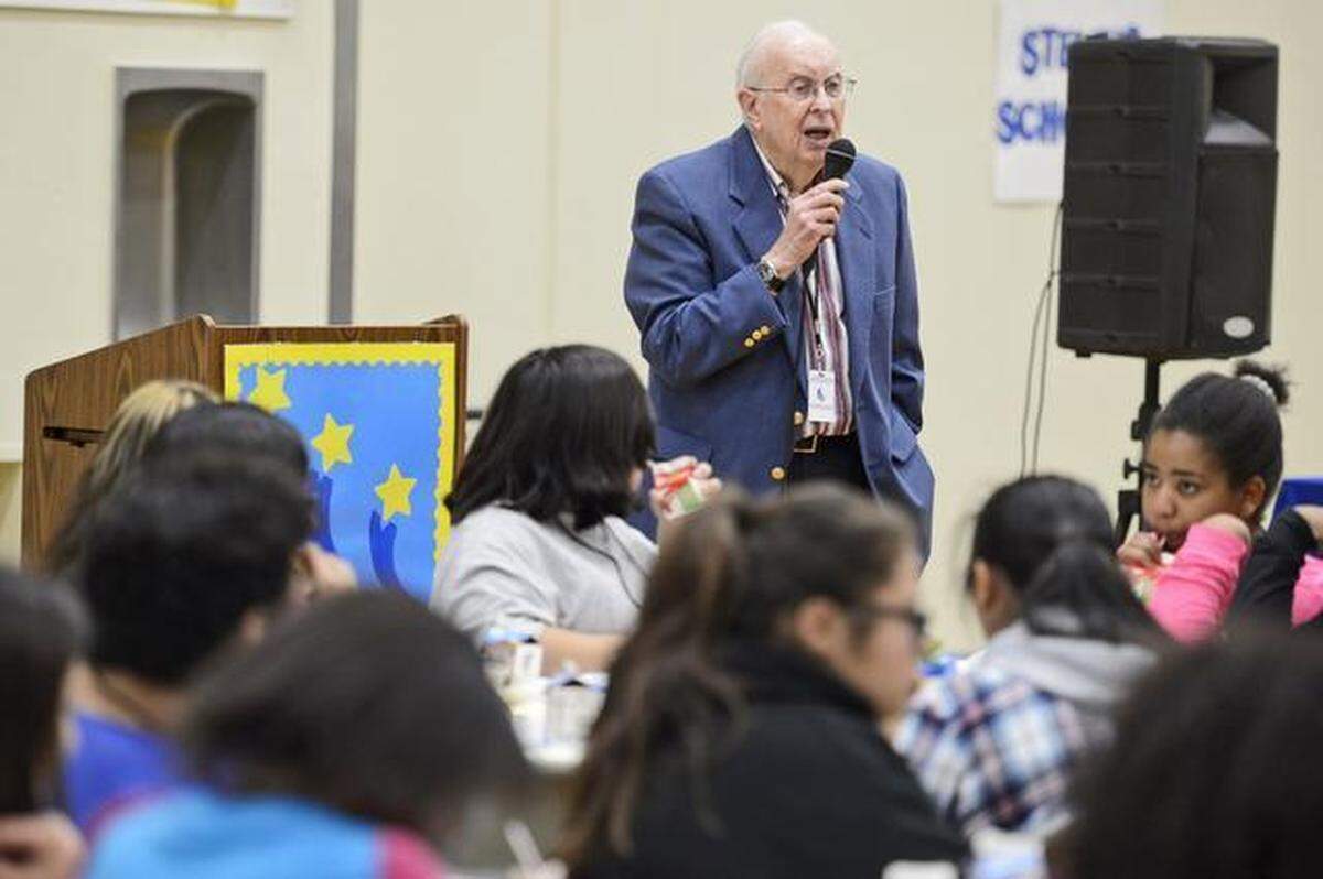 Murray Farber talks to seventh graders from Tehipite Middle School during a luncheon to honor them as being on track to become Steve’s Scholars at the school on Thursday, Feb. 5, 2015.  File photo