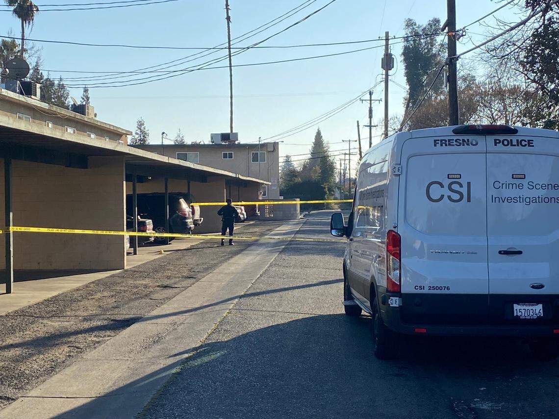Fresno police investigate in the area of Clinton Avenue west of Fresno Street after a stabbing on Tuesday, March 1, 2022.