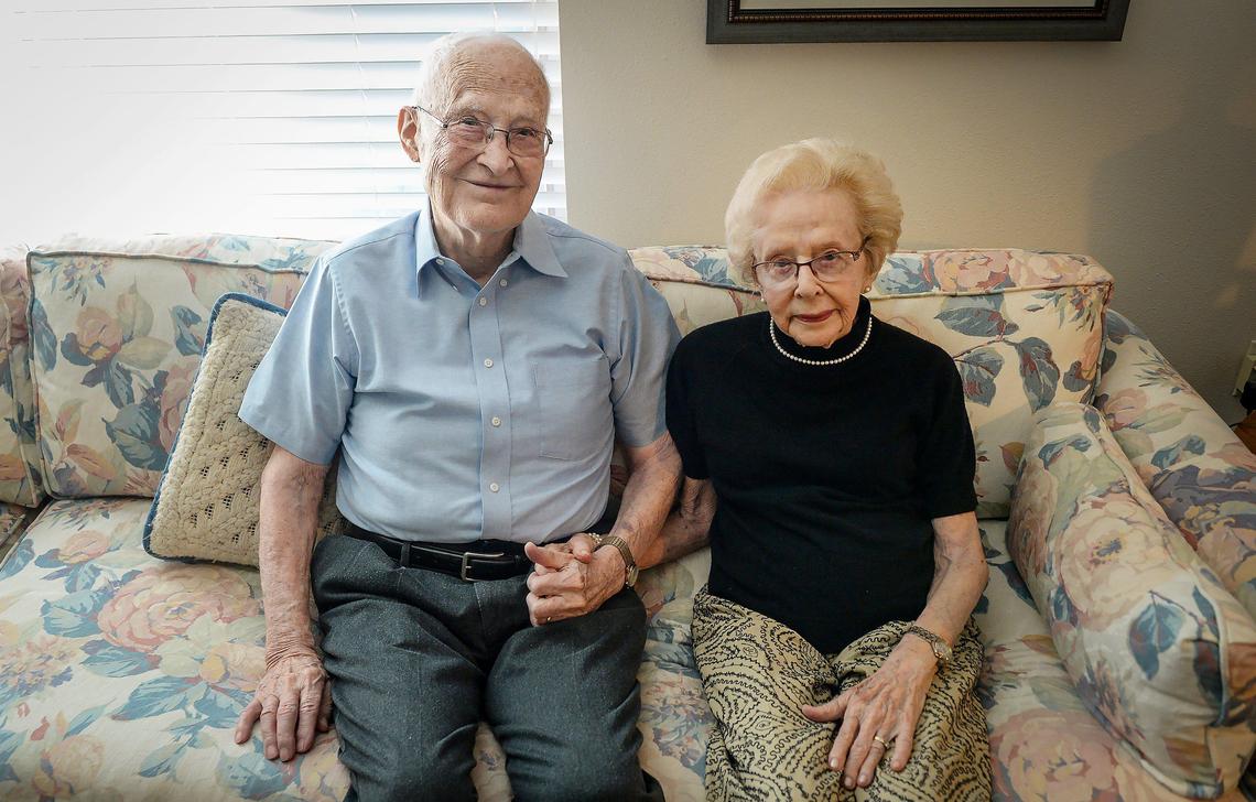 Malcolm and LaVerne Masten sit together in their apartment at the Terraces at San Joaquin Gardens in Fresno on Monday, Oct. 21, 2019. The couple, married 76 years, both celebrated turning 100 this year.