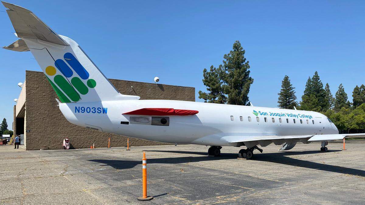 SkyWest Airlines donated this retired CRJ-200 regional jet to San Joaquin Valley College’s aviation campus at Fresno Yosemite International Airport to provide hands-on training for students learning to be aircraft mechanics. The 23-year-old, 50-seat jet was recently repainted with the school’s name and logo.