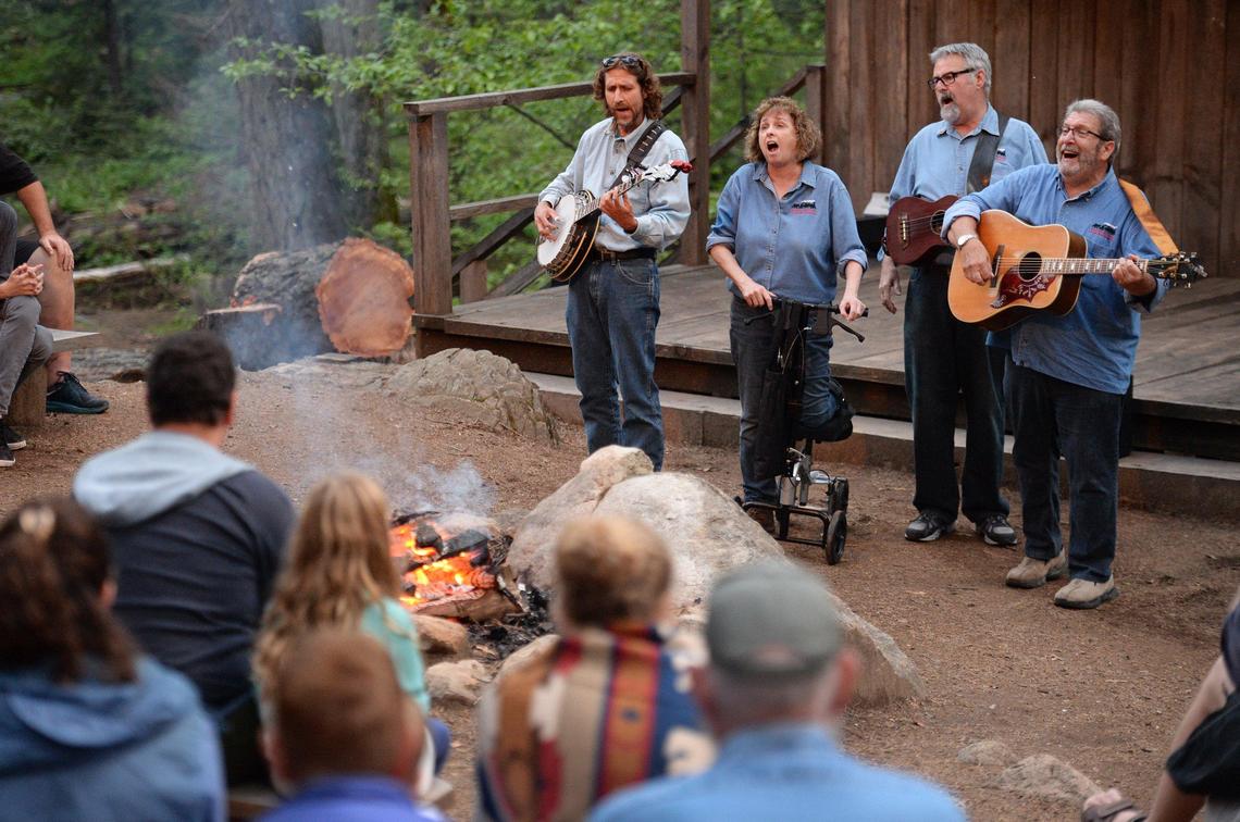 Members of the Sugar Pine Band peform during the midway break of a Yosemite Mountain Sugar Pine Railroad “moonlight special” excursion through the Sierra National Forest on Wednesday, June 6, 2019.