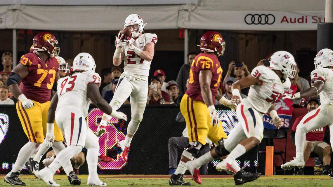 Fresno State linebacker Justin Rice picks off a pass in the red zone last season at USC. The senior from Modesto was in on 10 tackles in that game with one sack, one forced fumble and an interception.
