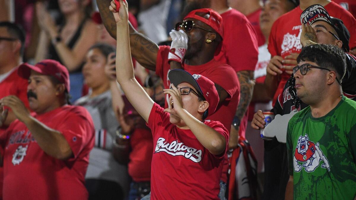 Fresno State fans cheer on the Bulldogs in their game against Oregon State at Valley Children’s Stadium in Fresno on Saturday, Sept. 10, 2022.