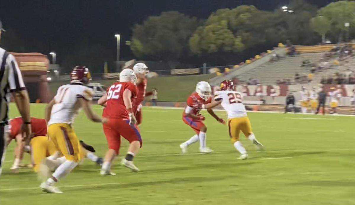Buchanan High QB Jayden Mandal throws a pass in the first half against Clovis West on Friday, Oct. 1, 2021.