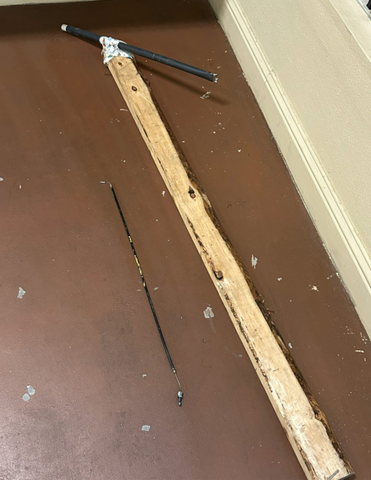 The tool that was believed to be used by burglars to “fish” wigs out from behind the shop’s security bars.