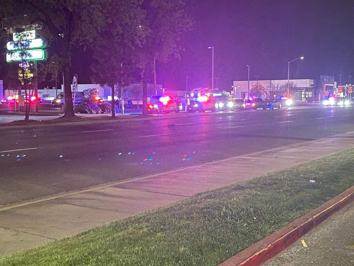Officers investigate a shooting in the parking lot outside of a nightclub in Fresno, California on Sunday, March 30, 2025.
