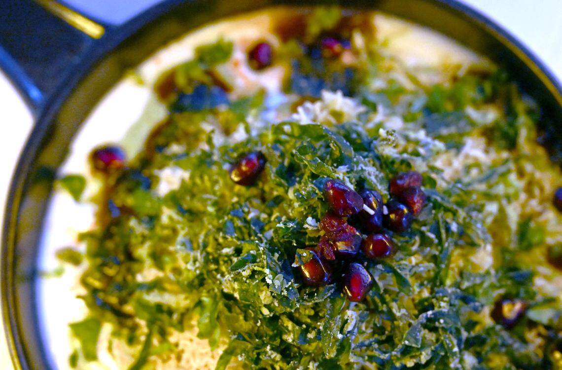 Dahi Bhalla with crackling Spinach topped with pomegranate seeds is shown, served at The Yellow Chilli, photographed Wednesday Jan. 7, 2026.