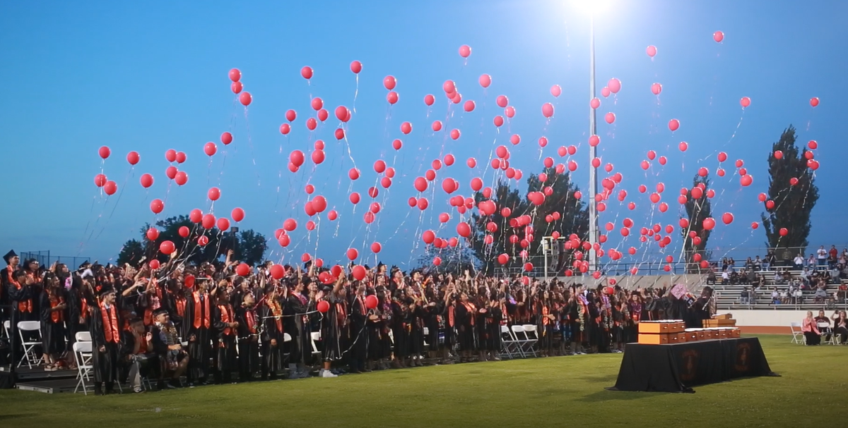 The entire Coalinga High School graduating Class 2022 released more than 250 red balloons in memory of senior Hazel Medina who would have graduated with them.