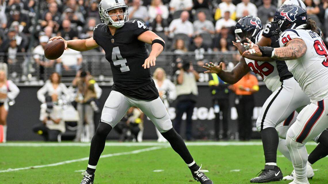 Las Vegas Raiders quarterback Derek Carr scrambles during the first half of an NFL football game against the Houston Texans, Sunday, Oct. 23, 2022, in Las Vegas.