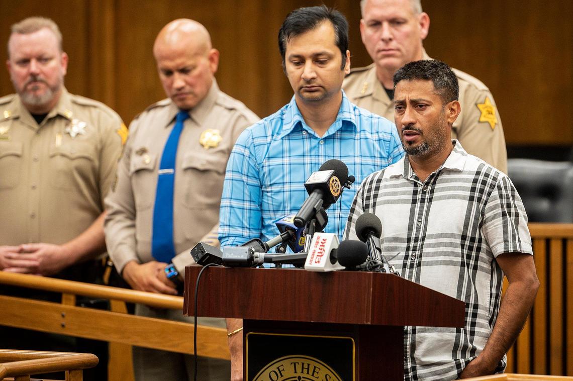 Family members Sukhdeep Singh, right, and Balwinder Saini, left, speak out following the kidnapping of 8-month-old Aroohi Dheri, her parents Jasleen Kaur, 27, and Jasdeep Singh, 36, and her uncle Amandeep Singh, 39, during a news conference in Merced, Calif., on Wednesday, Oct. 5, 2022. Authorities said the family was kidnapped at gunpoint Monday morning from a business they operated off of South Highway 59 in Merced County.