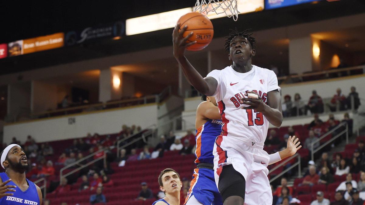 Fresno State’s Aguir Agau drives by Boise State’s RayJ Dennis Saturday, Jan. 25, 2020 in Fresno. The Bulldogs lost 87-53, their worst loss ever at the Save Mart Center.