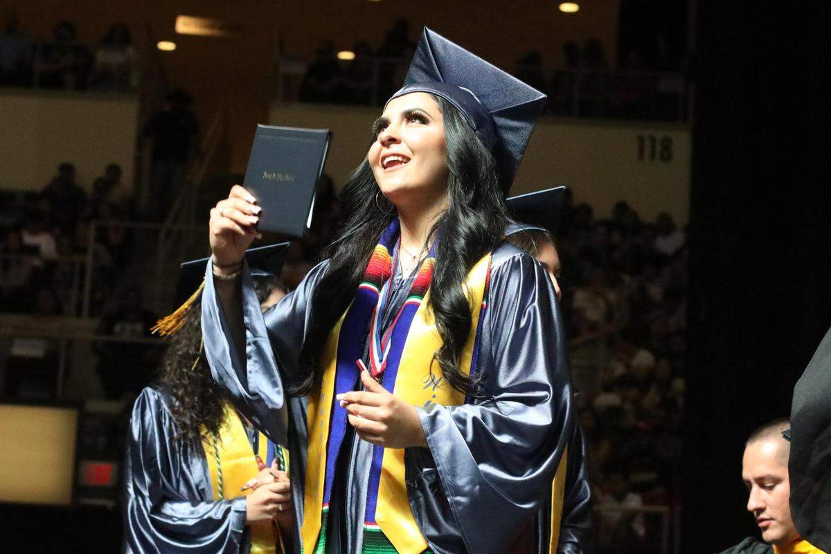 A graduate during the Sunnyside High graduation ceremony held at the Save Mart Center on June 6, 2023.