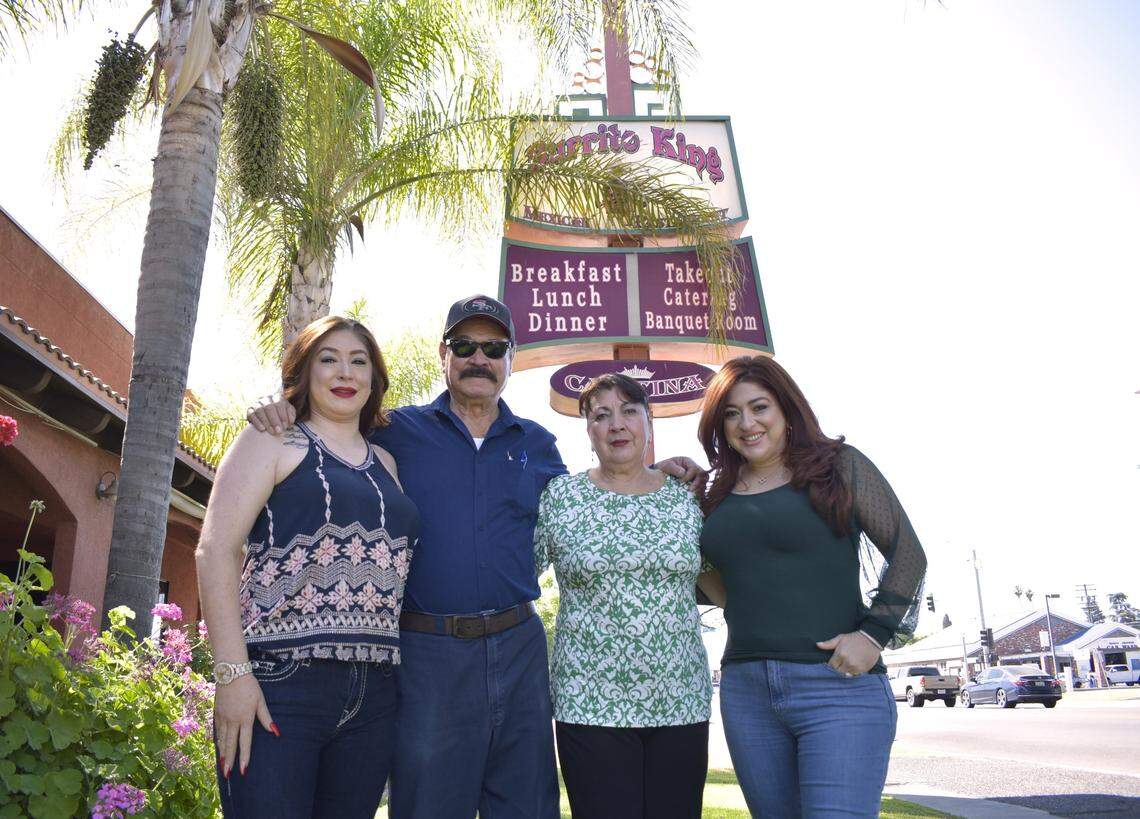 Raul and Ede Castro, center, plan to retire from ownership of Burrito King in central Madera after this year. Their daughters, Maira, left, and Erica, right, will be taking over the more than 50-year-old restaurant.