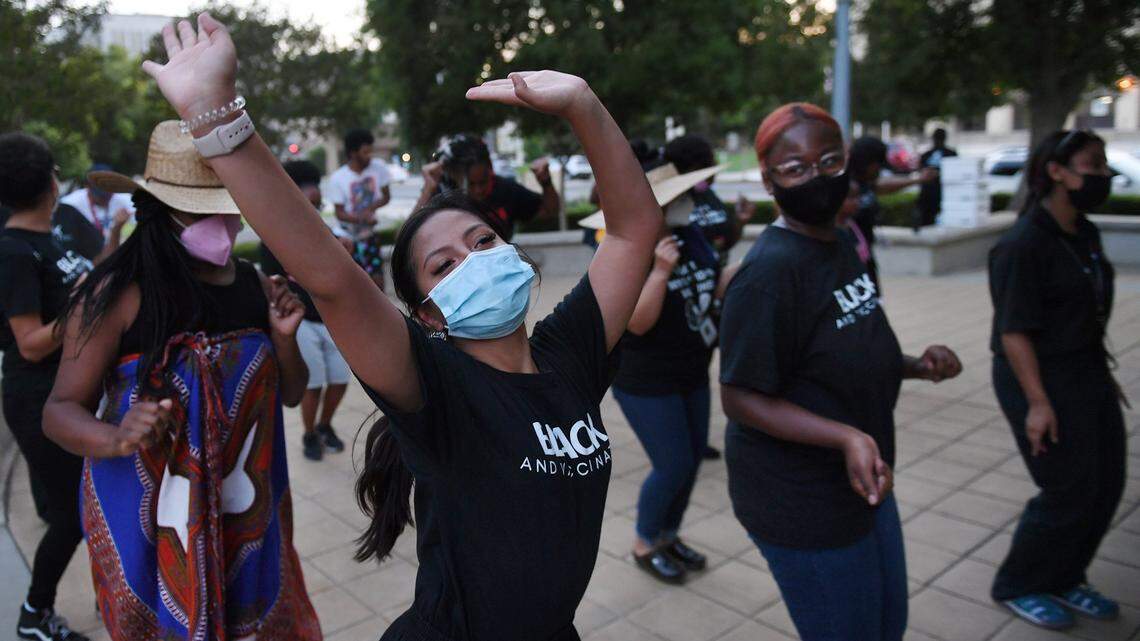 Kaeli Brooks, center, dances with others at the Black Lives Matter Day: Black Joy event at Eaton Plaza last June in Fresno. Sponsored by the Fresno State chapter of NAACP and a coalition of others, the event kicked off Juneteenth celebrations in the city.