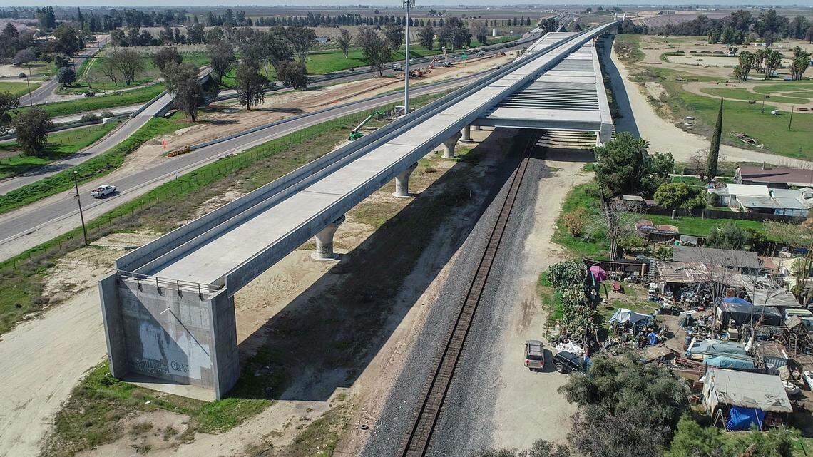 An elevated section of the California High Speed Rail crosses a pergola above the Union Pacific Railroad near Highway 99 and Herndon Avenue during construction of the bullet train railway on Thursday, March 4, 2021.