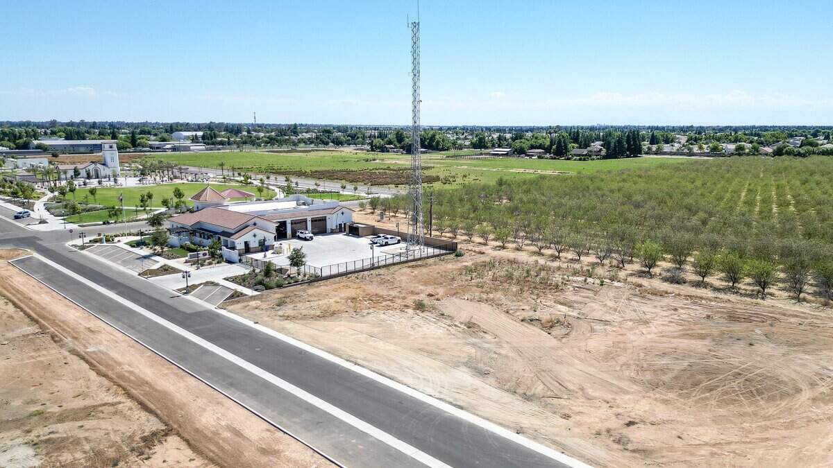 A proposed new dispatch center for the city of Clovis is planned for the northwestern corner of Loma Vista Parkway and Encino Avenue next to the city's Fire Station 6 in the Loma Vista area of Clovis. The plot of land for the proposal is shown to the right of the fire station, left, photographed on Monday, June 29, 2026.