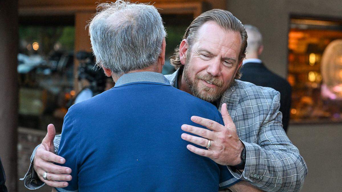 Nathan Magsig, right, a member of the Fresno County Board of Supervisors and who is running for State Senate, hugs former Fresno Mayor Lee Brand during a election night watch party at The Elbow Room in Fresno on Tuesday, June 2, 2026.
