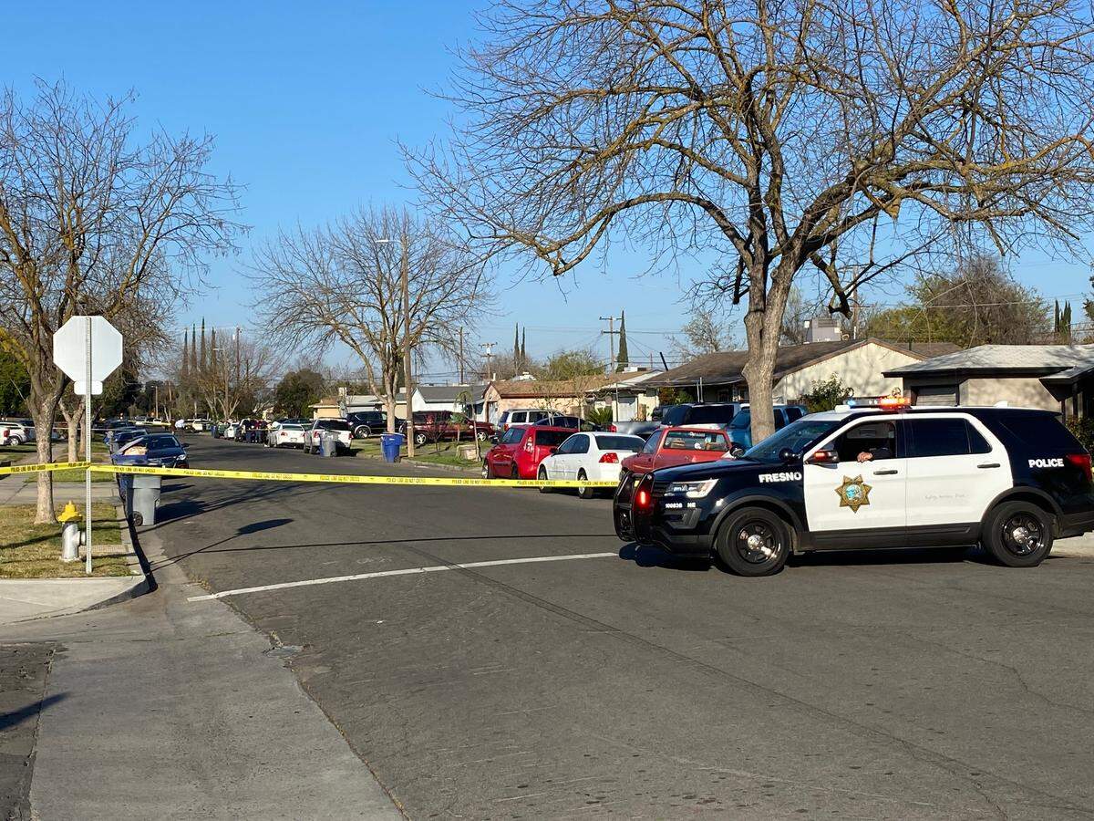 Police investigate the fatal shooting of a 20-year-old man on Holland Avenue east of Fresno Street in the neighborhood north of Ashlan Avenue.