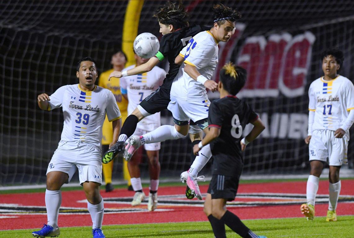 McLane’s Cristian Garcia, top left, goes up against Terra Linda’s Elvin Maldonado, top right, in the CIF Northern California Regional Division III boys soccer championship Saturday, March 4, 2023 in Fresno. Terra Linda won the championshiop with a final score of 2-0.