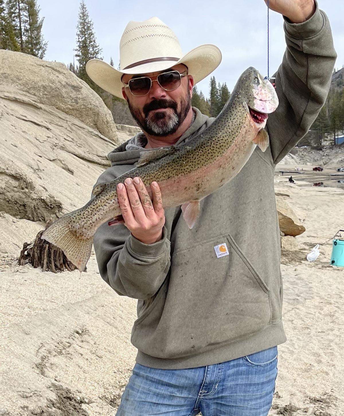 Ben Farris of Clovis shows off his 26-inch, 7-pound rainbow trout caught off the bank at Shaver Lake on Feb. 5 on rainbow Power Bait.