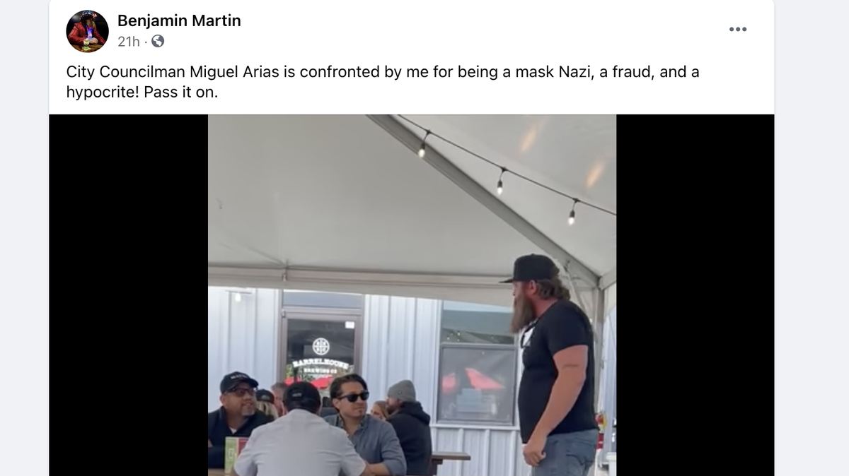 In a screen grab from a Facebook video post, Fresno anti-masker Ben Martin, right, is seen confronting Fresno City Councilmember Miguel Arias, left in a hat, at a Paso Robles brewery on Sunday.