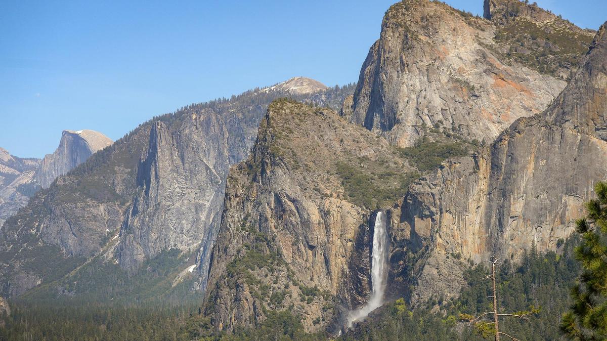 Phil Fullerton has enjoyed many trips to Yosemite National Park. In this photo from last April, Half Dome comes into view at left while water rushes over Bridalveil Fall. 