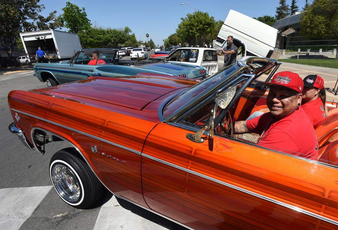 Gabriel Casares shows off his ’66 Chevy Impala during a gathering of lowrider car enthusiasts at City Hall, Monday April 12, 2021, to kick off the Cruisin’ For Peace event to support Fresno’s street vendors, to be held in late April or early May.