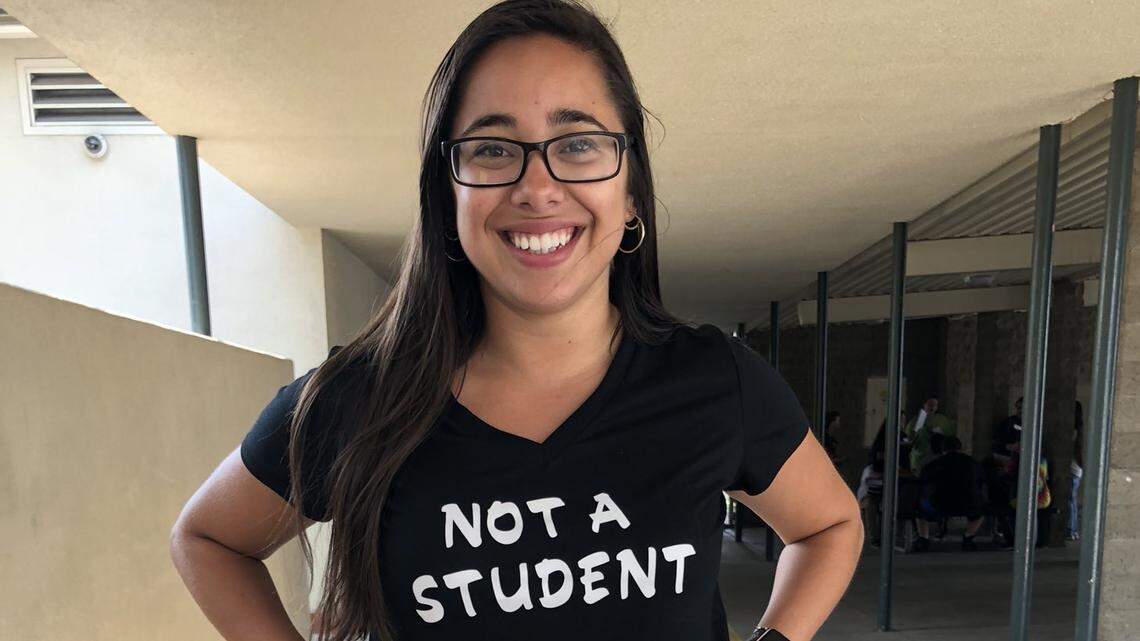Stephanie Nechay shows off her “Not A Student” T-shirt during last week’s seventh-grade orientation. Nechay, despite getting confused as a student sometimes, is actually a science teacher at Scandinavian middle school. School starts back up Monday for Fresno Unified School District.