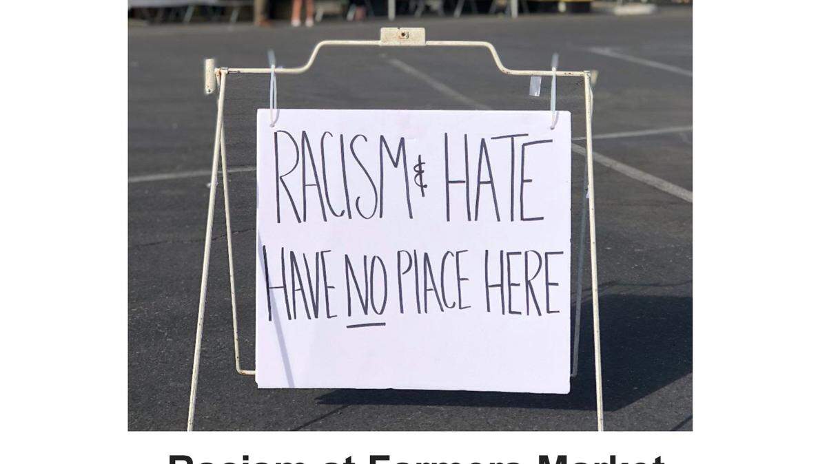 This sign was posted at the entrance to the Visalia Farmers Market after the manager heard about people using racist language. This is a screenshot of her email about the sign.