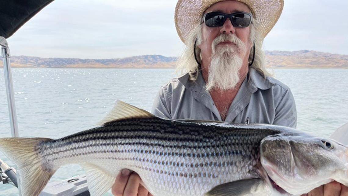 Randy Jacobsen of Easton shows off a striper caught June 16 at San Luis Reservoir.