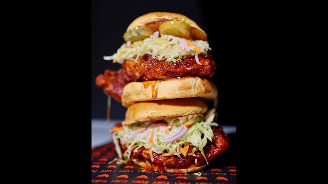 This Nashville hot chicken sandwich is made with a blend of spices, including peppers that food truck FURY Hot Chicken dries and grinds itself. It’s served with pickles, cole slaw and a honey-blaze sauce.