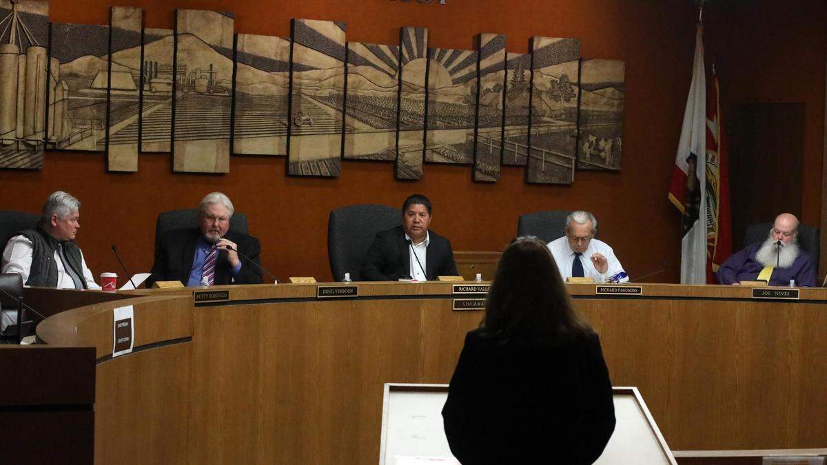 Kings County Board of Supervisors Chairman Richard Valle, (center) whose 965-square-mile district includes Home Garden, Corcoran, Avenal and Kettleman City, during the board April 4 meeting in Hanford.