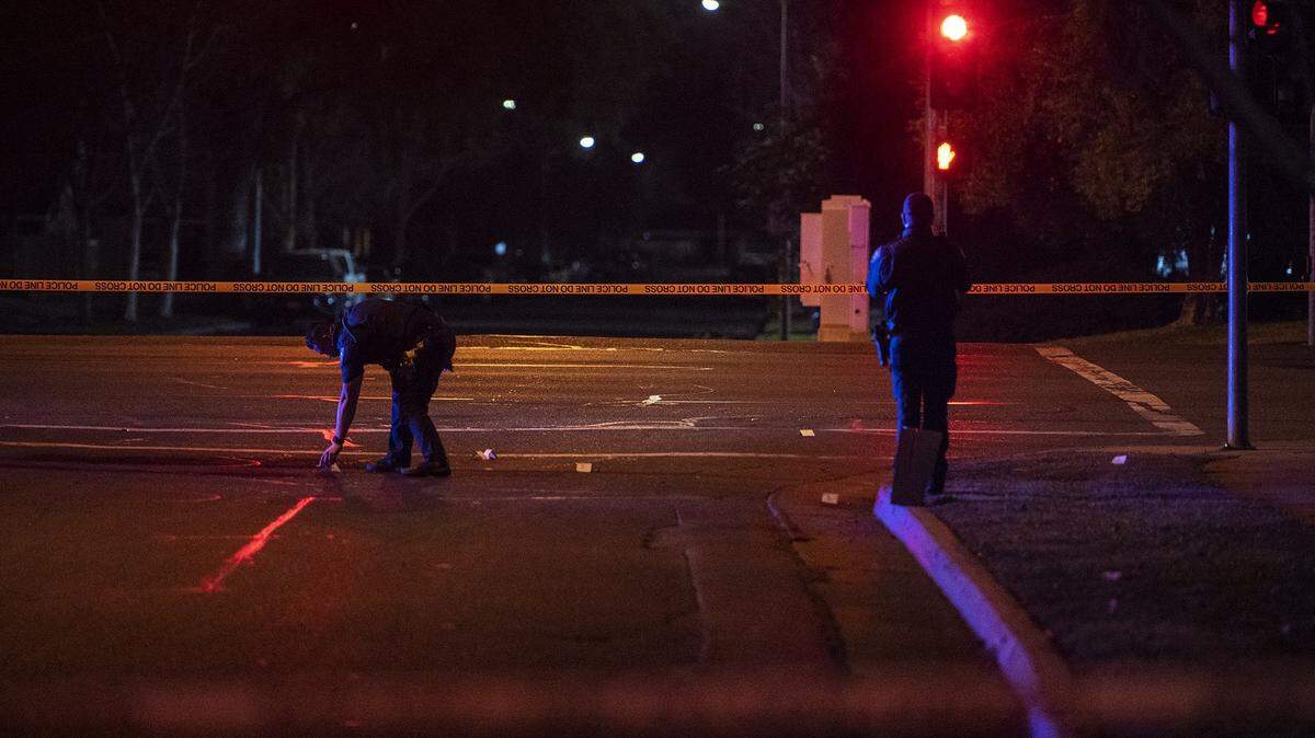 Merced police investigate the scene of shooting near the intersection of Olive Avenue and Meadows Avenue in Merced, Calif., on Tuesday, Feb. 8, 2022. s.
