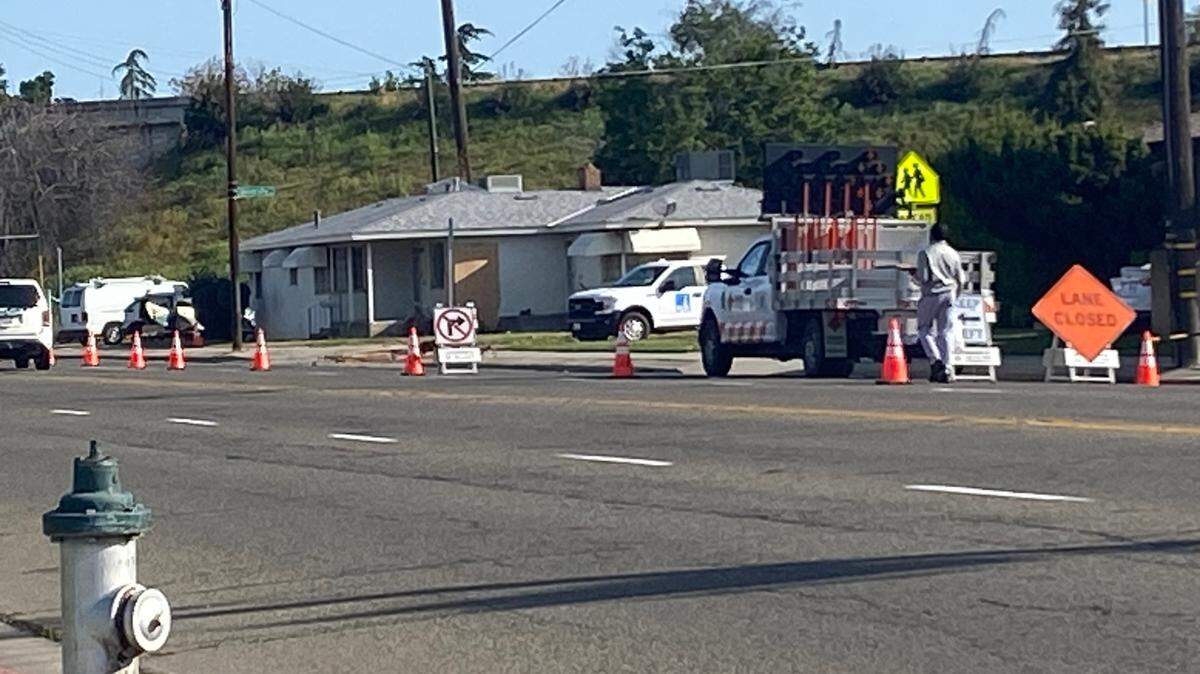 PG&E crews work to restore power after a vehicle struck a power pole and a house on Friday, March 28, 2025.