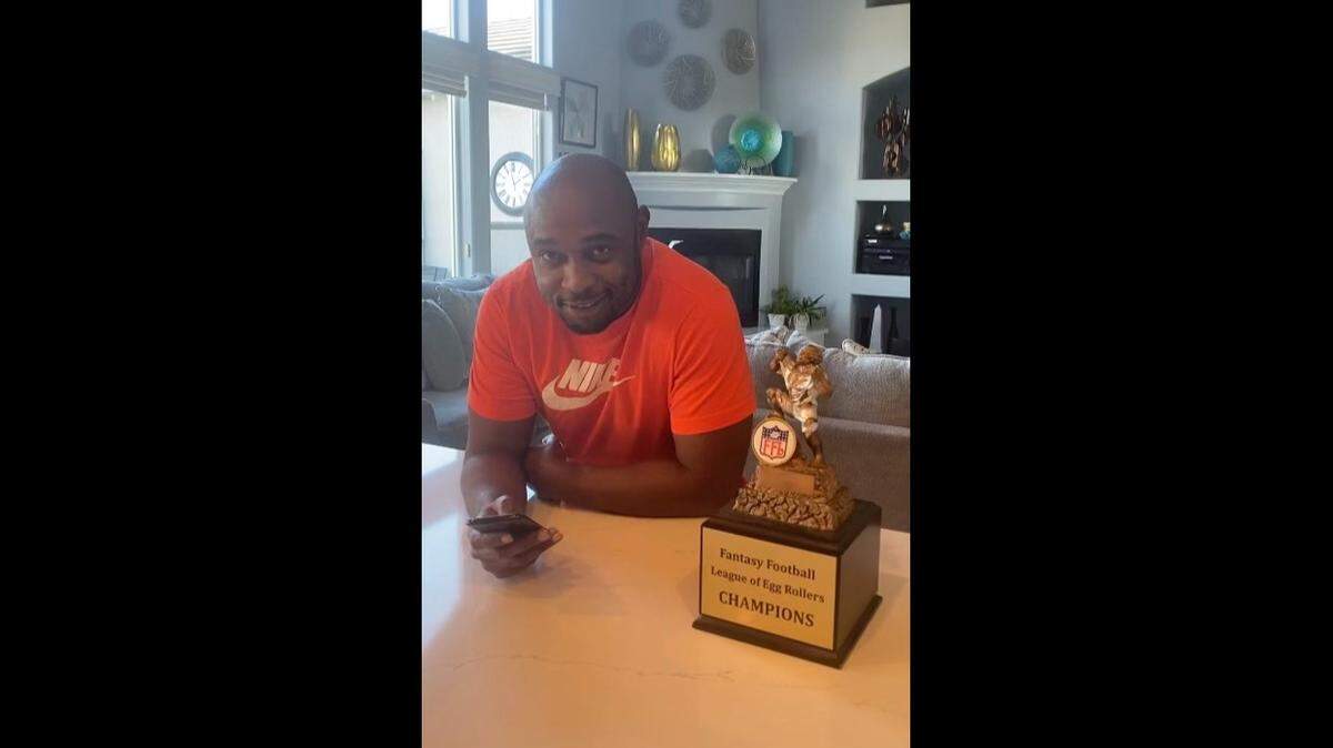 Michael Thomas with a Fantasy Football trophy. He was reportedly a diligent student of the game.