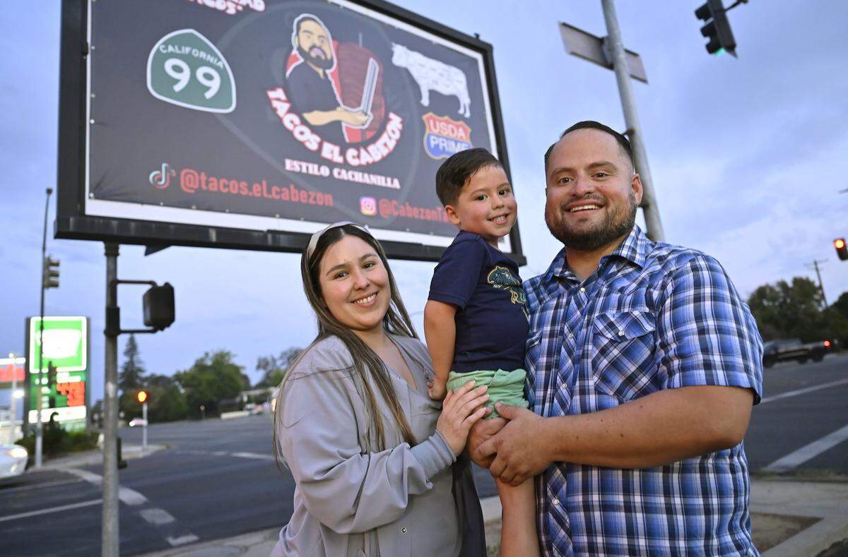 Armando Arias Jr., shown with this wife Linda Arias and son Joel Arias, 3, opened Tacos El Cabezon at the corner of Shaw and Maroa avenues. Photographed Wednesday, Sept. 24, 2025 in Fresno.