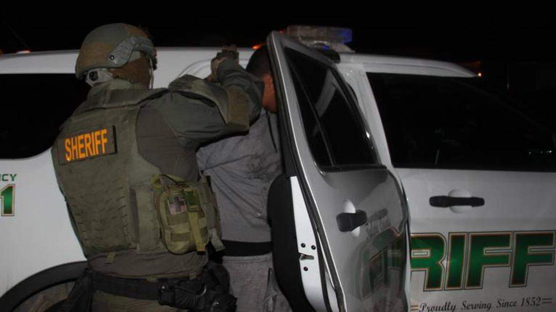 Tulare County Sheriff’s deputies make an arrest after multiple homes and prison cells were searched in the last week of February as part of “Operation Nightmare.”