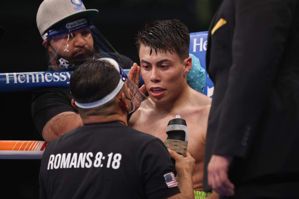 Marc Castro and Luis Javier Valdes during their bout at the Alamodome in San Antonio on Saturday, Dec. 19, 2020.